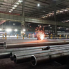 Close-up of hot-dip galvanized steel pipe surface - smooth zinc coating with no bare spots for long-term rust protection